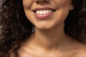 Woman with a white smile.